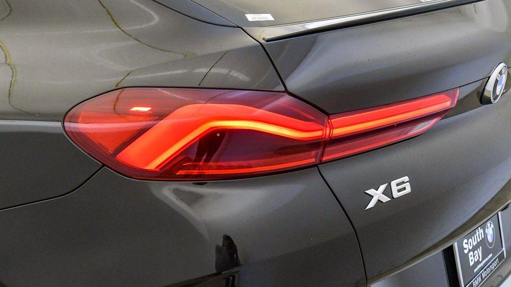 used 2023 BMW X6 car, priced at $60,248