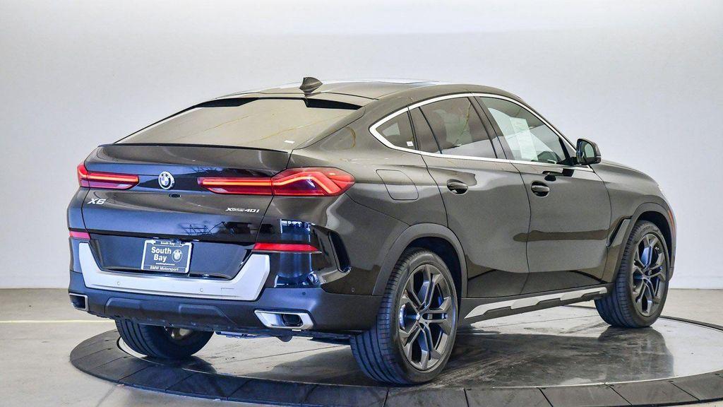 used 2023 BMW X6 car, priced at $60,248