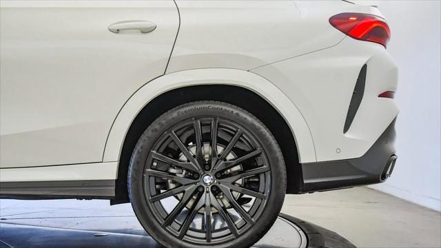 used 2023 BMW X6 car, priced at $63,999