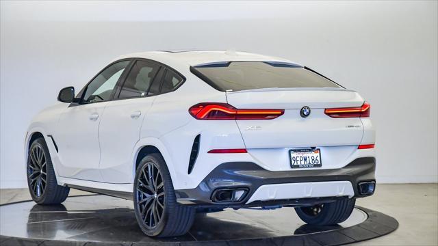 used 2023 BMW X6 car, priced at $63,999