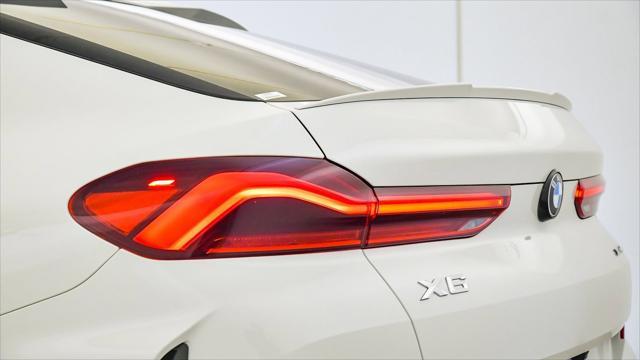 used 2023 BMW X6 car, priced at $63,999