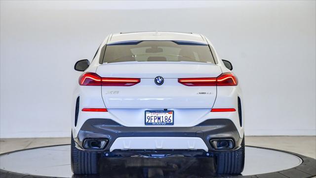 used 2023 BMW X6 car, priced at $63,999