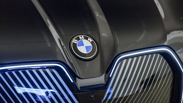 new 2026 BMW iX car, priced at $84,520