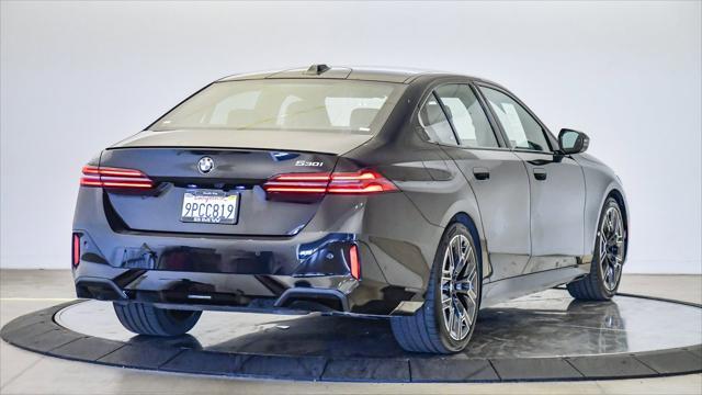 used 2025 BMW 530 car, priced at $68,870