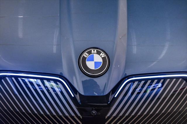 new 2026 BMW iX car, priced at $85,270