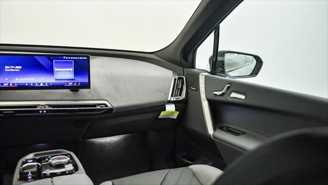 new 2026 BMW iX car, priced at $75,275