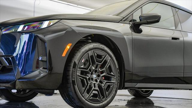 new 2026 BMW iX car, priced at $75,275