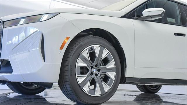 new 2026 BMW iX car, priced at $77,125