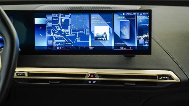 used 2023 BMW iX car, priced at $53,299