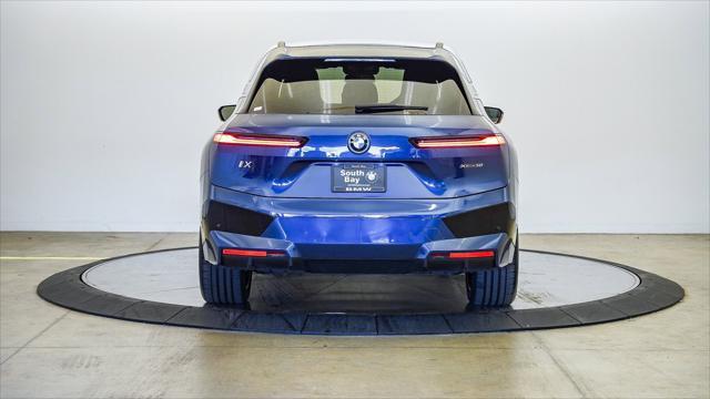 used 2023 BMW iX car, priced at $53,299
