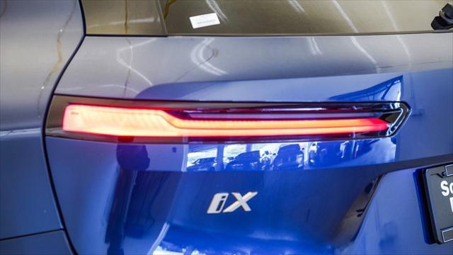 used 2023 BMW iX car, priced at $53,299