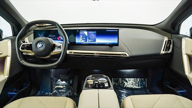 used 2023 BMW iX car, priced at $53,299