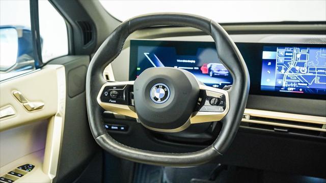 used 2023 BMW iX car, priced at $53,299