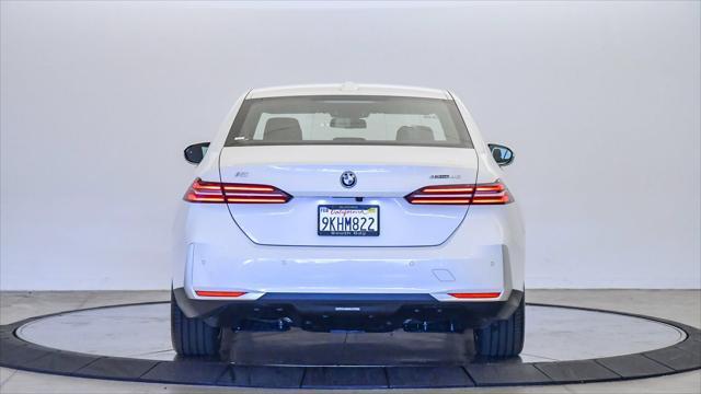 used 2024 BMW i5 car, priced at $68,995