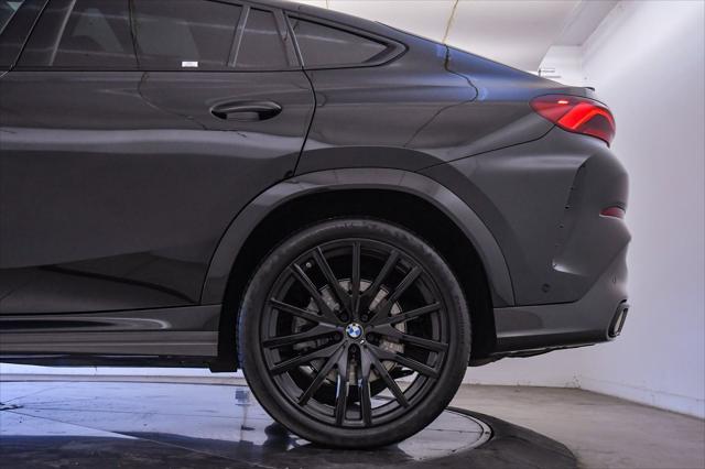 used 2023 BMW X6 car, priced at $61,599