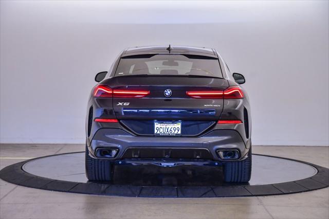 used 2023 BMW X6 car, priced at $61,599
