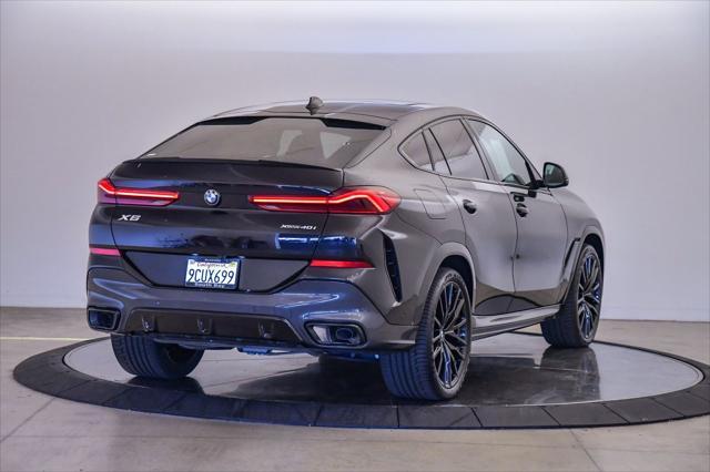 used 2023 BMW X6 car, priced at $61,599