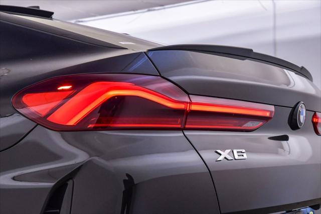used 2023 BMW X6 car, priced at $61,599