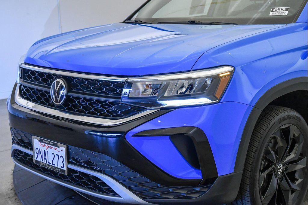used 2024 Volkswagen Taos car, priced at $22,125