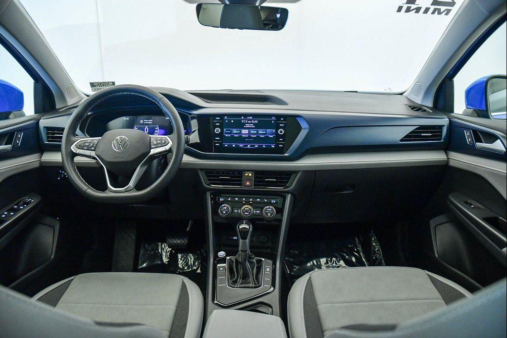 used 2024 Volkswagen Taos car, priced at $22,125