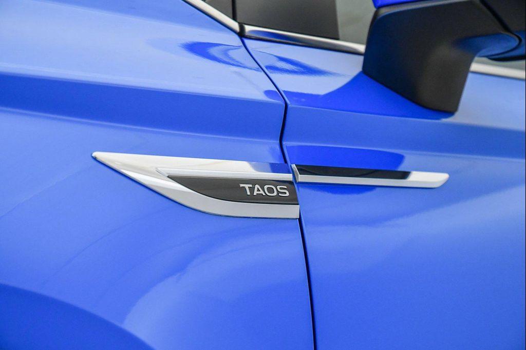 used 2024 Volkswagen Taos car, priced at $22,125