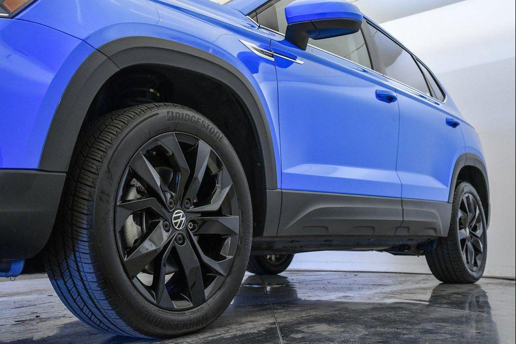 used 2024 Volkswagen Taos car, priced at $22,125