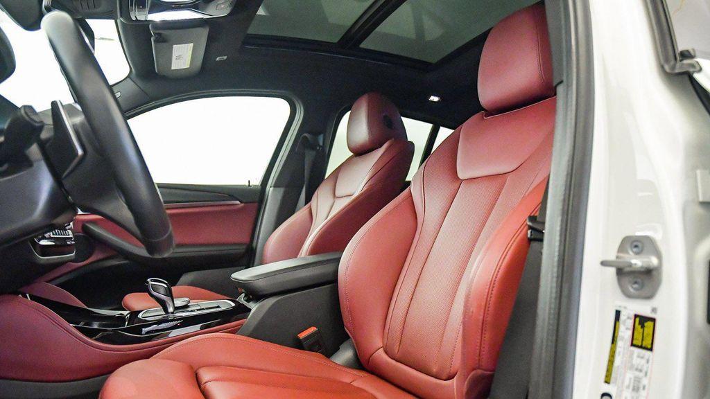 used 2023 BMW X4 car, priced at $44,999