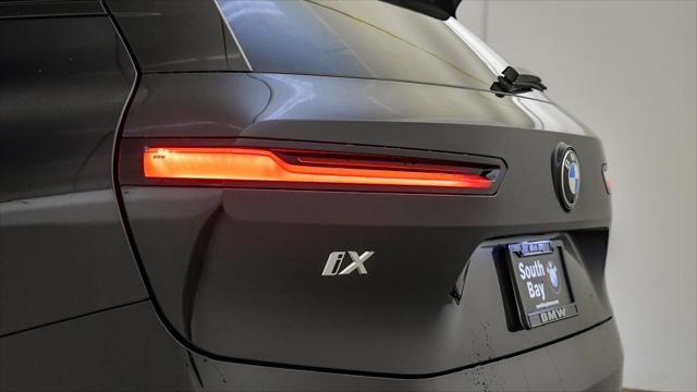 new 2026 BMW iX car, priced at $74,075