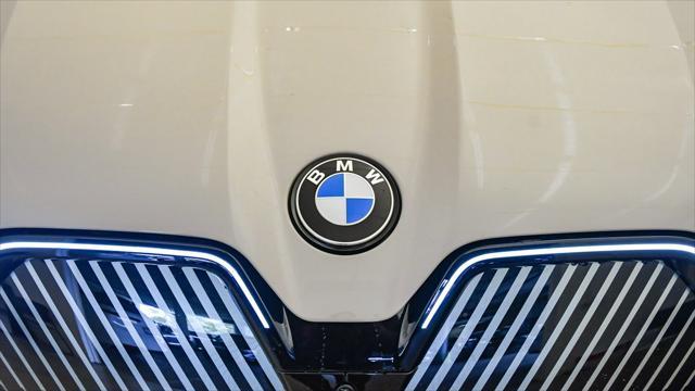new 2026 BMW iX car, priced at $86,870