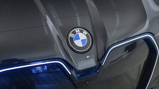 new 2026 BMW iX car, priced at $77,125