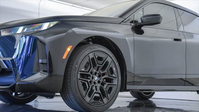 new 2026 BMW iX car, priced at $77,125