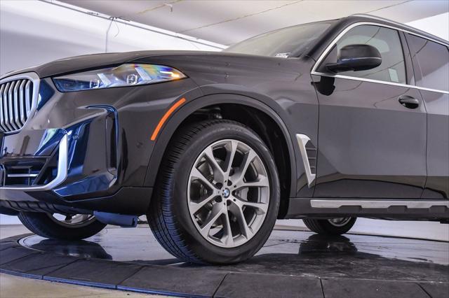 used 2025 BMW X5 car, priced at $68,800