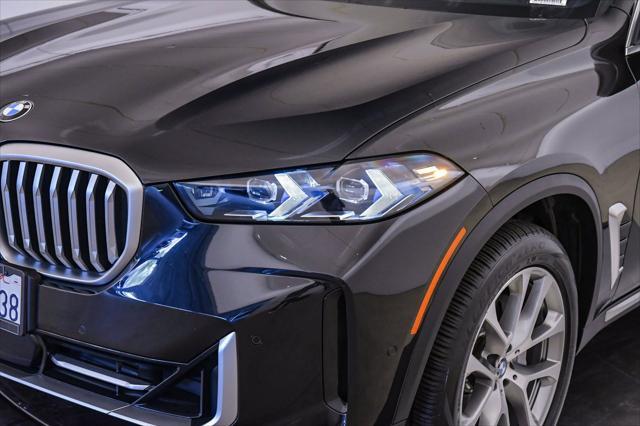 used 2025 BMW X5 car, priced at $68,800