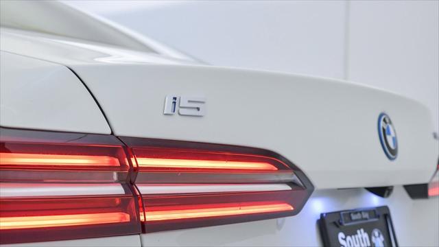 used 2025 BMW i5 car, priced at $76,845