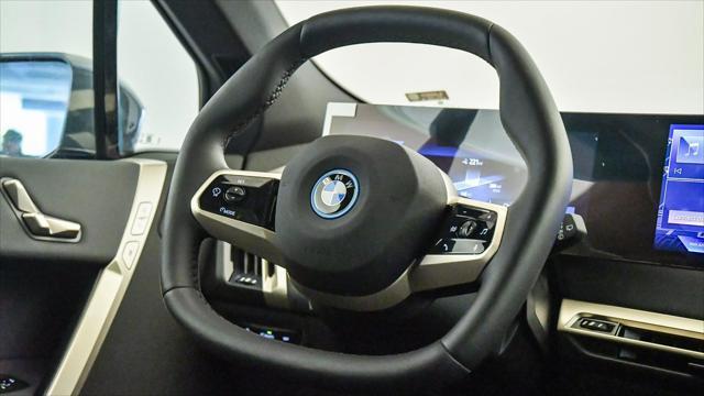 new 2025 BMW iX car, priced at $86,095