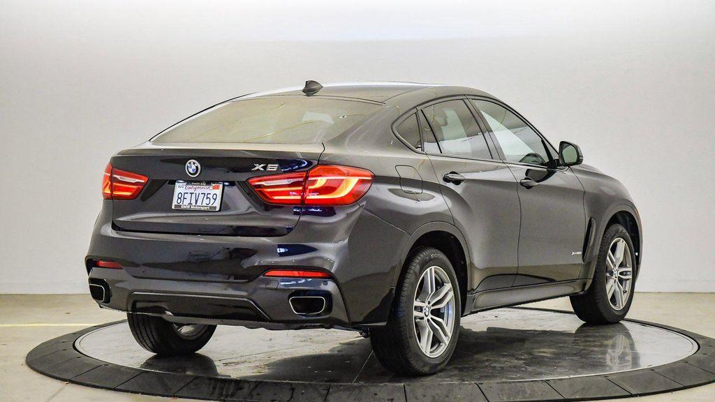used 2018 BMW X6 car, priced at $29,599