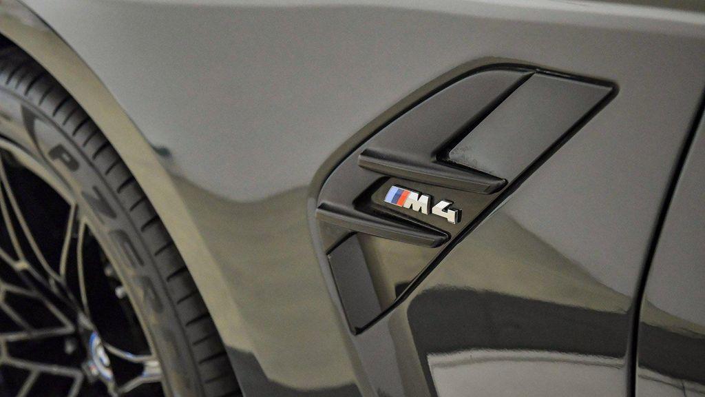 used 2022 BMW M4 car, priced at $69,999