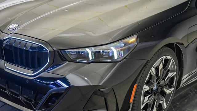 new 2025 BMW 550e car, priced at $83,675