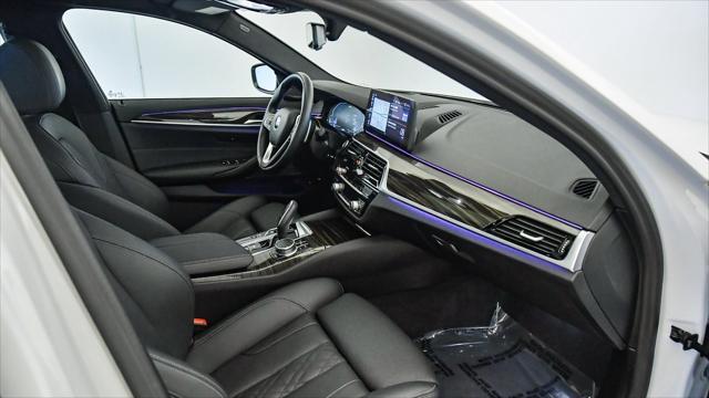 used 2023 BMW 530e car, priced at $38,299