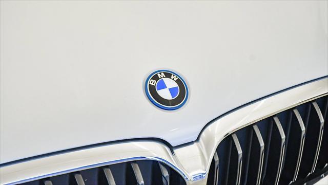 used 2023 BMW 530e car, priced at $38,299