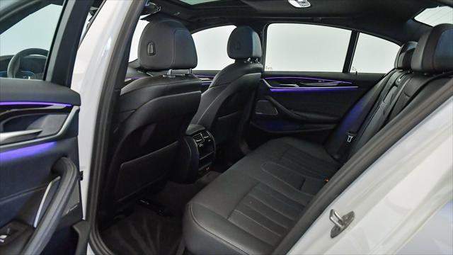 used 2023 BMW 530e car, priced at $38,299