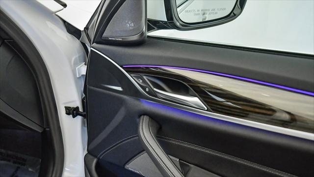 used 2023 BMW 530e car, priced at $38,299