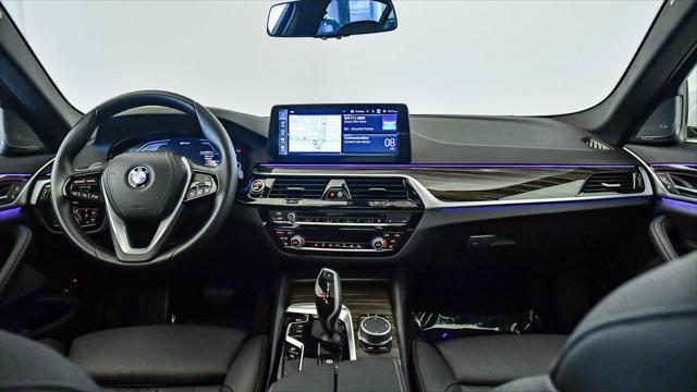used 2023 BMW 530e car, priced at $38,299