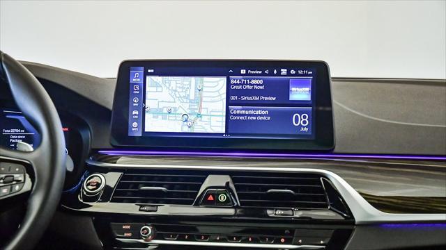 used 2023 BMW 530e car, priced at $38,299