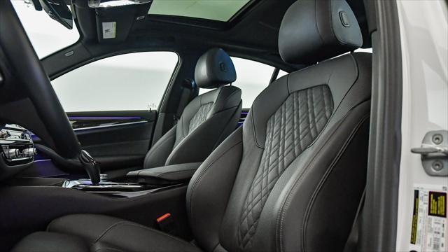used 2023 BMW 530e car, priced at $38,299