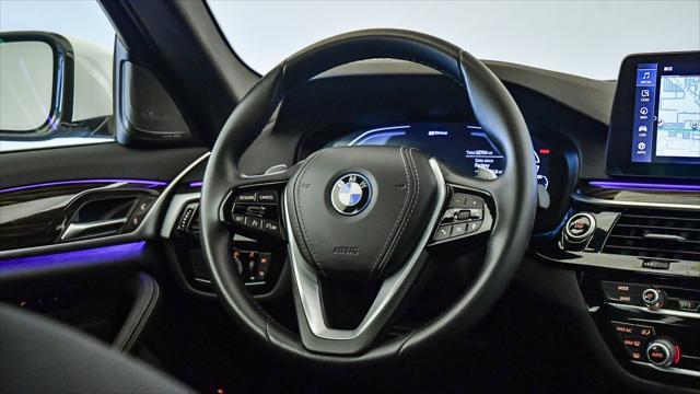 used 2023 BMW 530e car, priced at $38,299