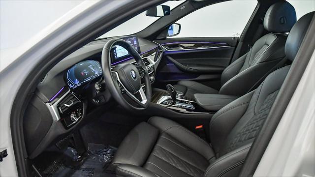 used 2023 BMW 530e car, priced at $38,299