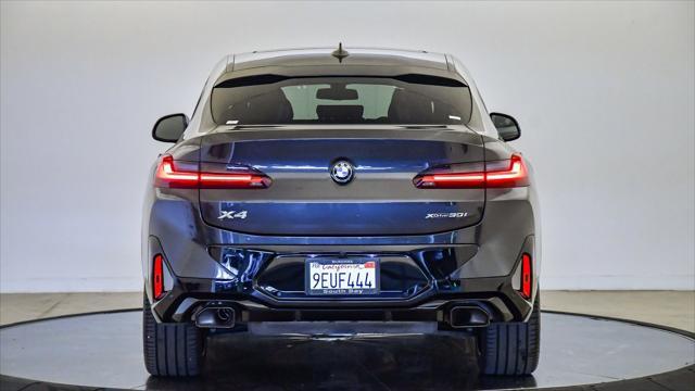 used 2023 BMW X4 car, priced at $44,099