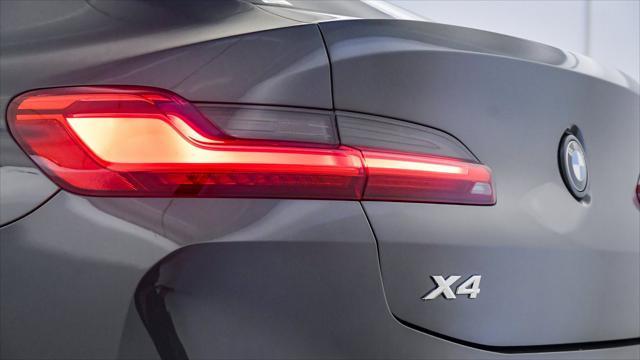 used 2023 BMW X4 car, priced at $44,099