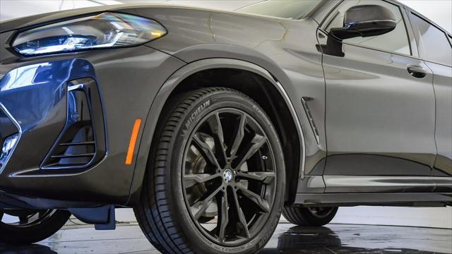 used 2023 BMW X4 car, priced at $44,099
